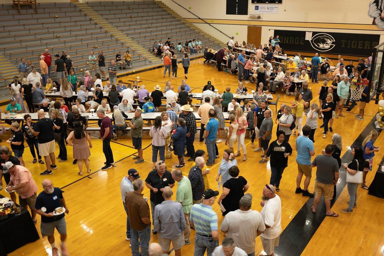 Alumni gathered in the Conroe High School gym